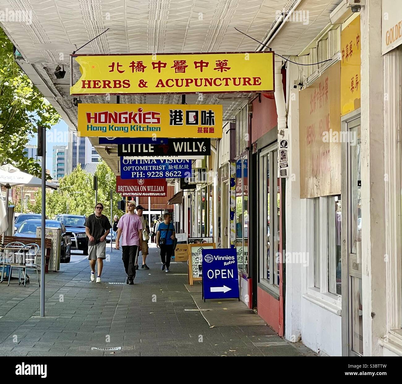 People walking in Chinatown along William street Northbridge Perth Western Australia Stock Photo