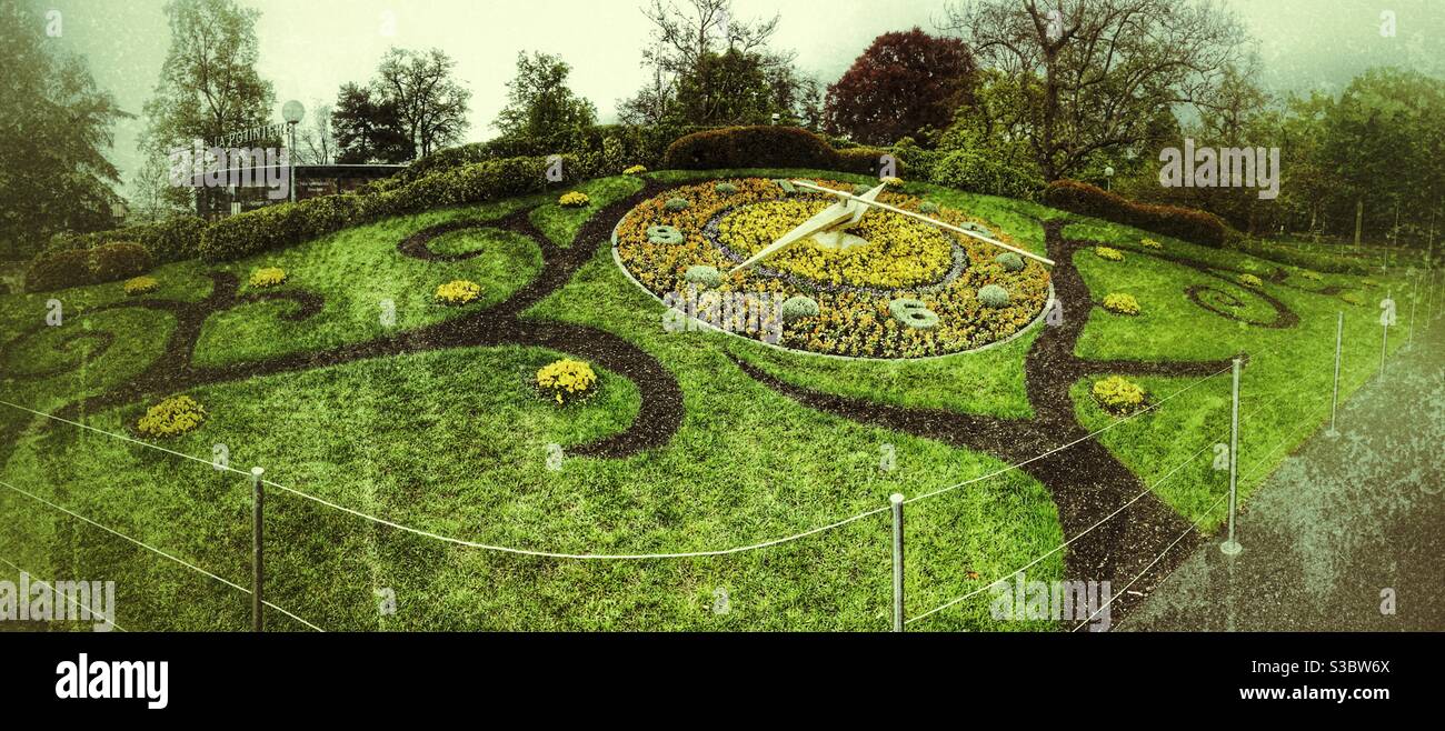 The English Garden famous flower Clock in Geneva Switzerland - Europe Stock Photo