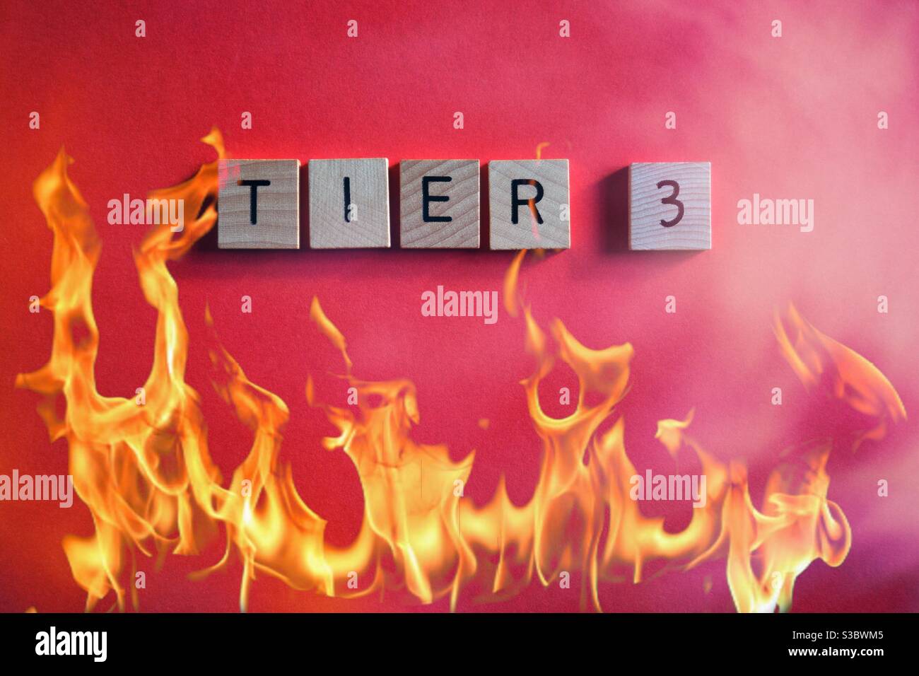 Tier 3, very high alert for areas of high coronavirus infection levels during the coronavirus pandemic - Smartphone Captured Stock Image