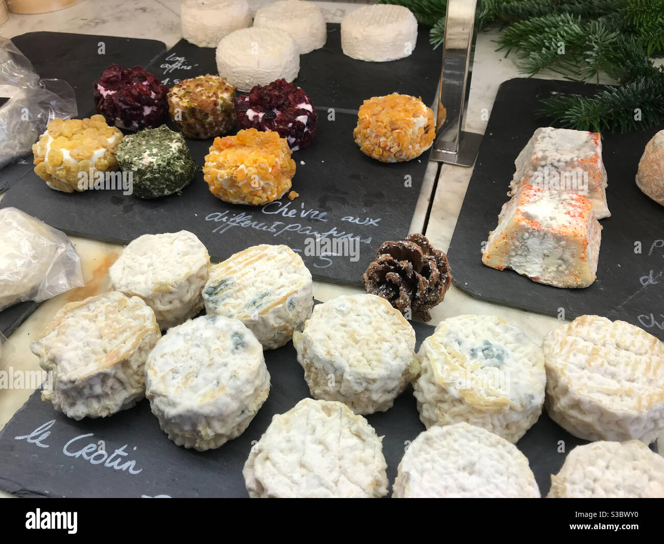 Plate with goat cheese in food market in France - Smartphone Captured Stock Image