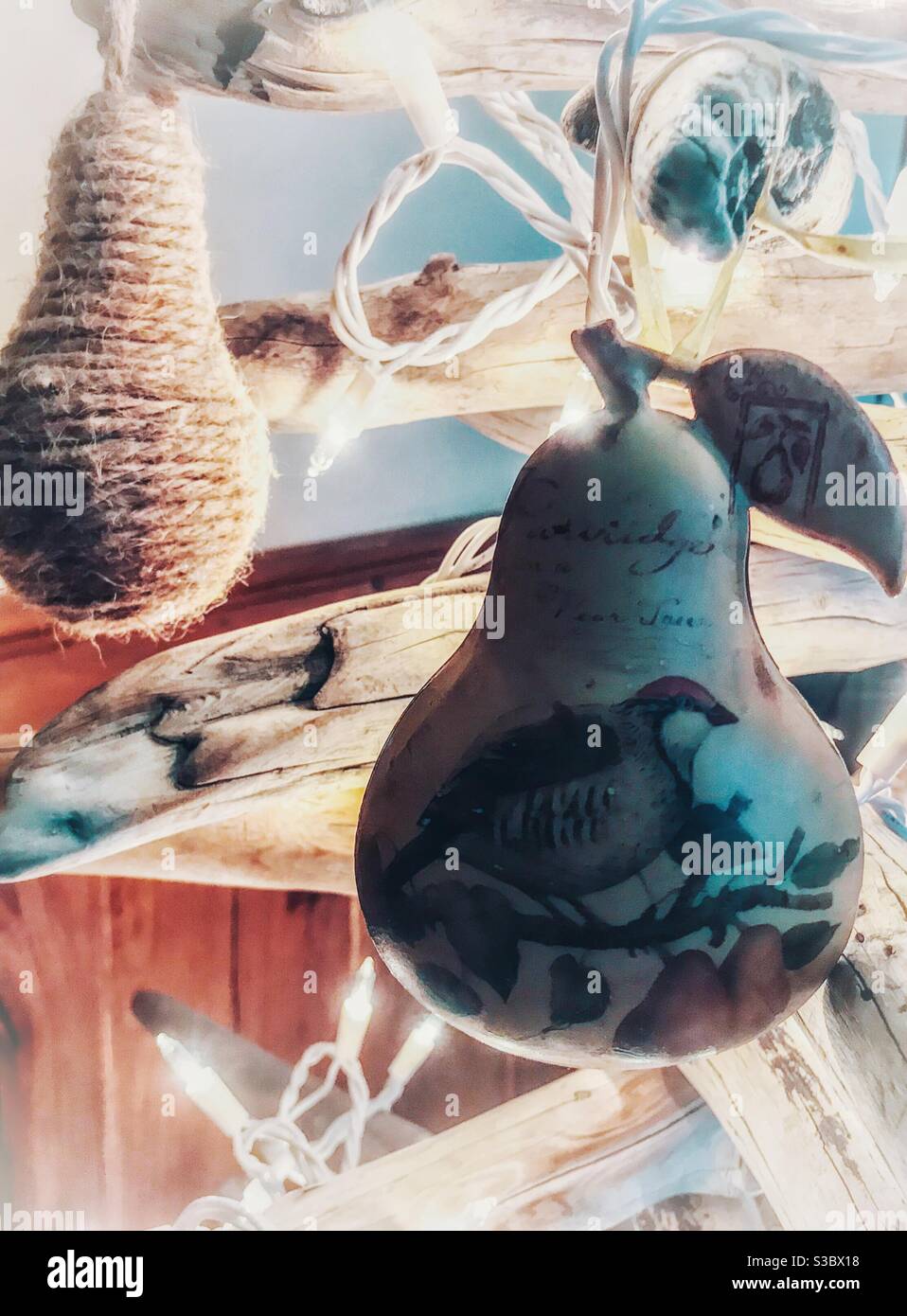 Driftwood Christmas tree with 2 pear ornaments - Smartphone Captured Stock Image