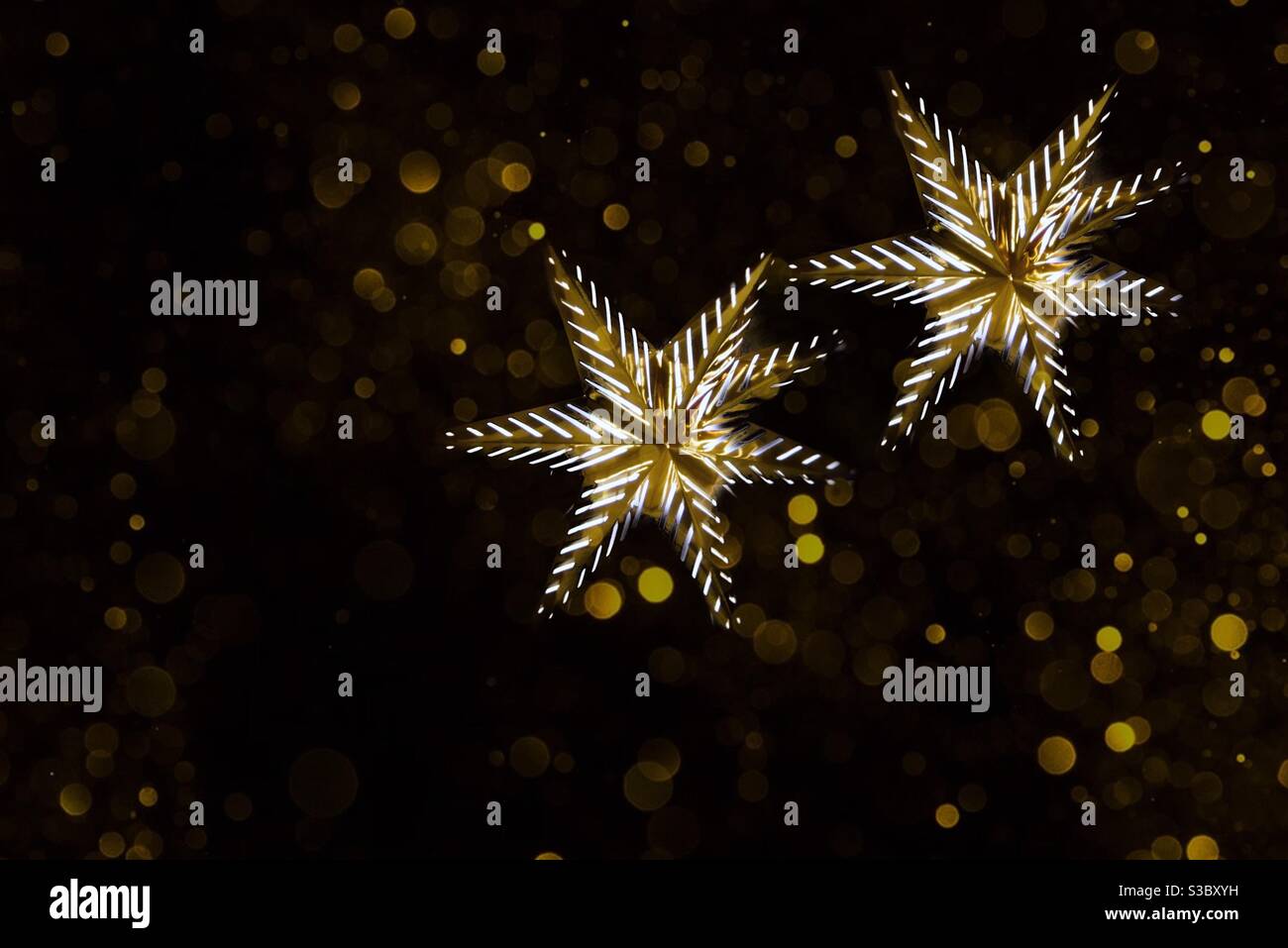 Stars on black background with gold effects Stock Photo - Alamy