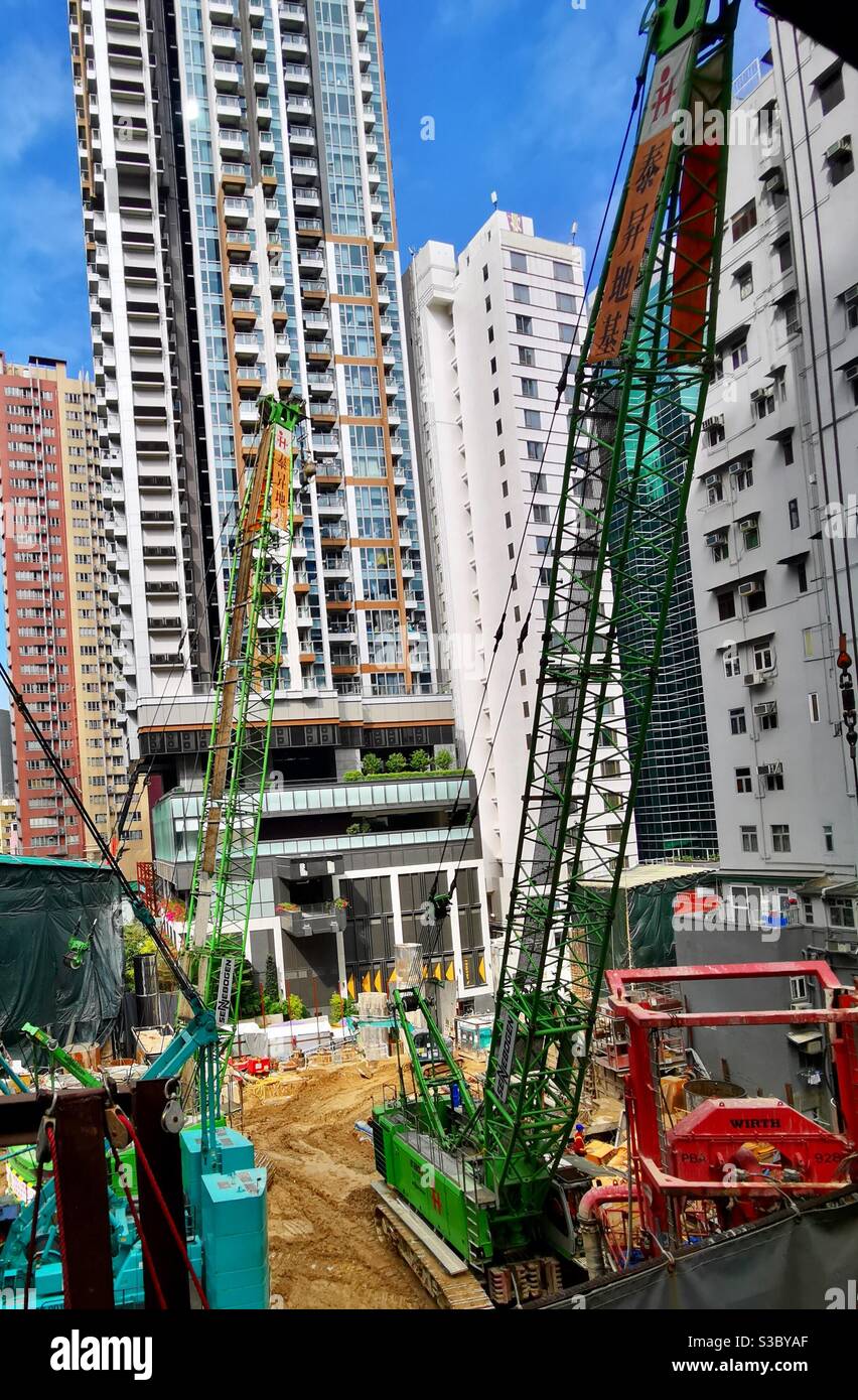Old buildings being replaced by new modern buildings in central Hong Kong. - Smartphone Captured Stock Image