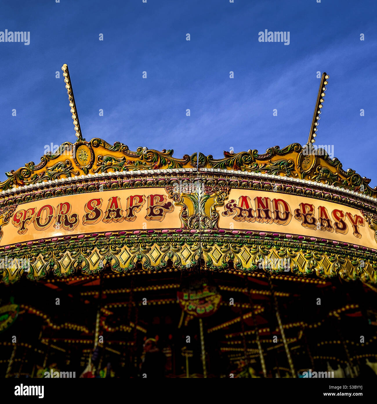 Traditional carousel with “FOR SAFE AND EASY” wording on top - Smartphone Captured Stock Image