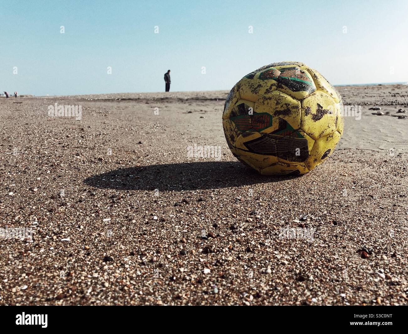 Abandoned football on beach Stock Photo Alamy