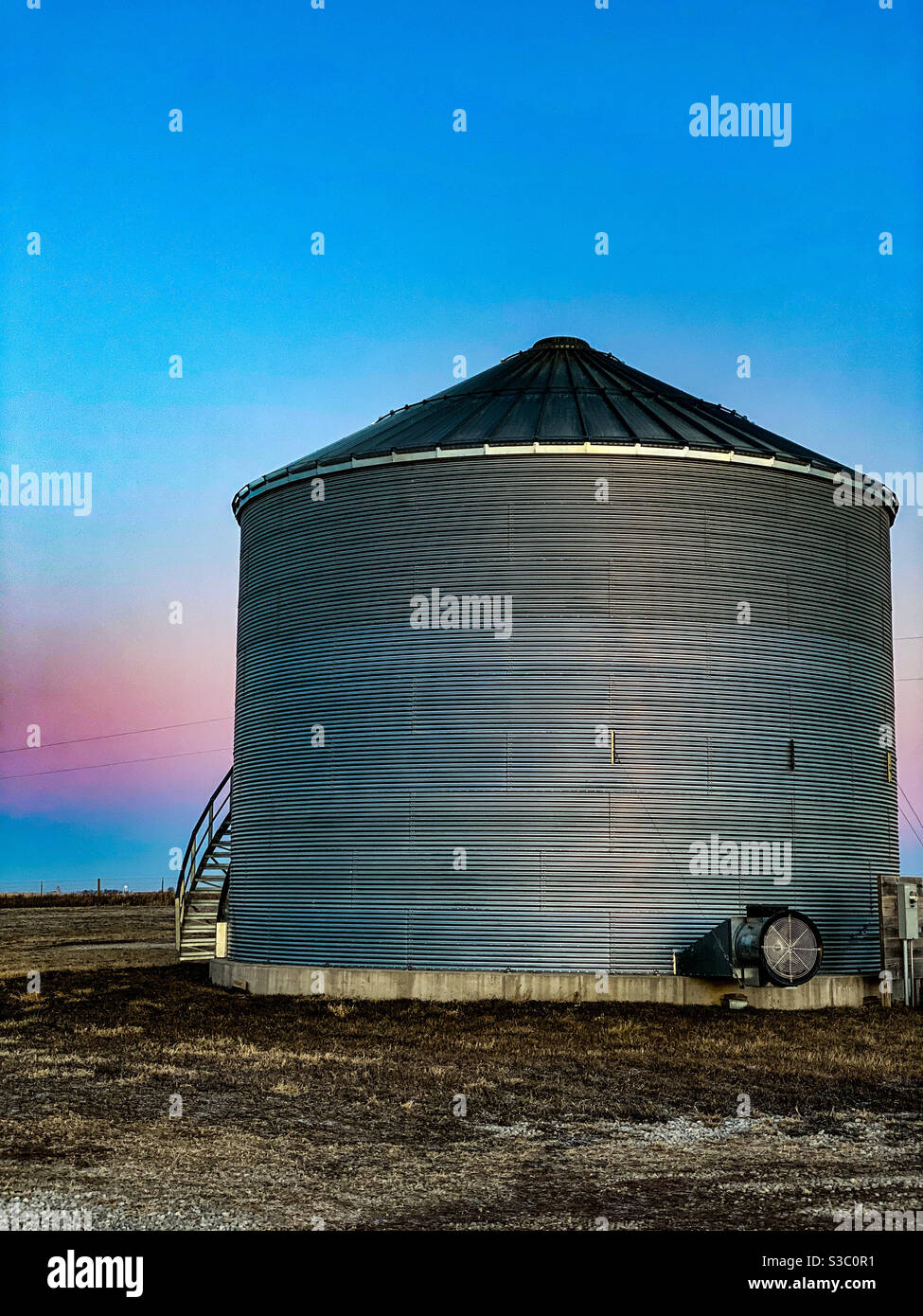 Corn silo at dawn in Iowa Stock Photo