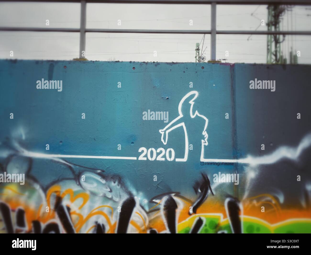 A Graffiti of the cartoon character la linea lamenting the year 2020, Berlin, Germany Stock Photo