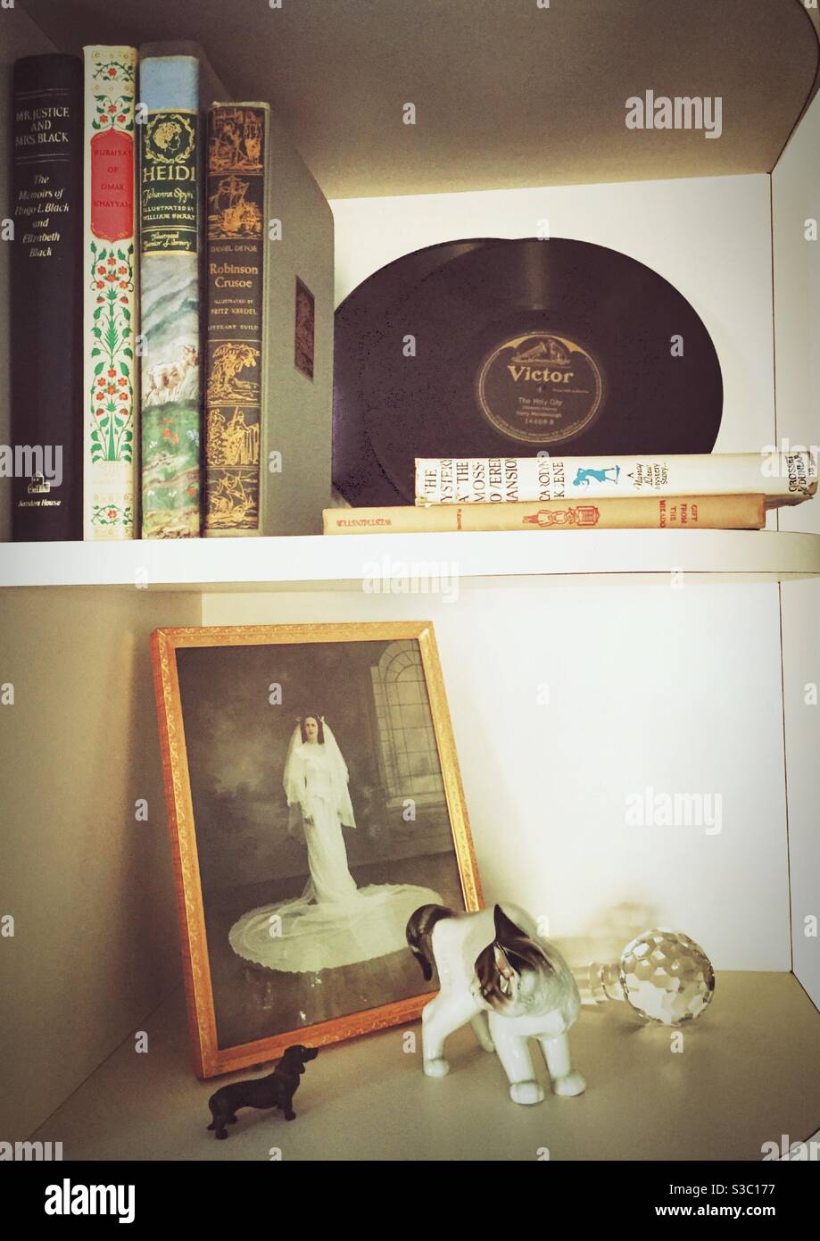 Vintage photograph and record on bookshelves, United States - Smartphone Captured Stock Image