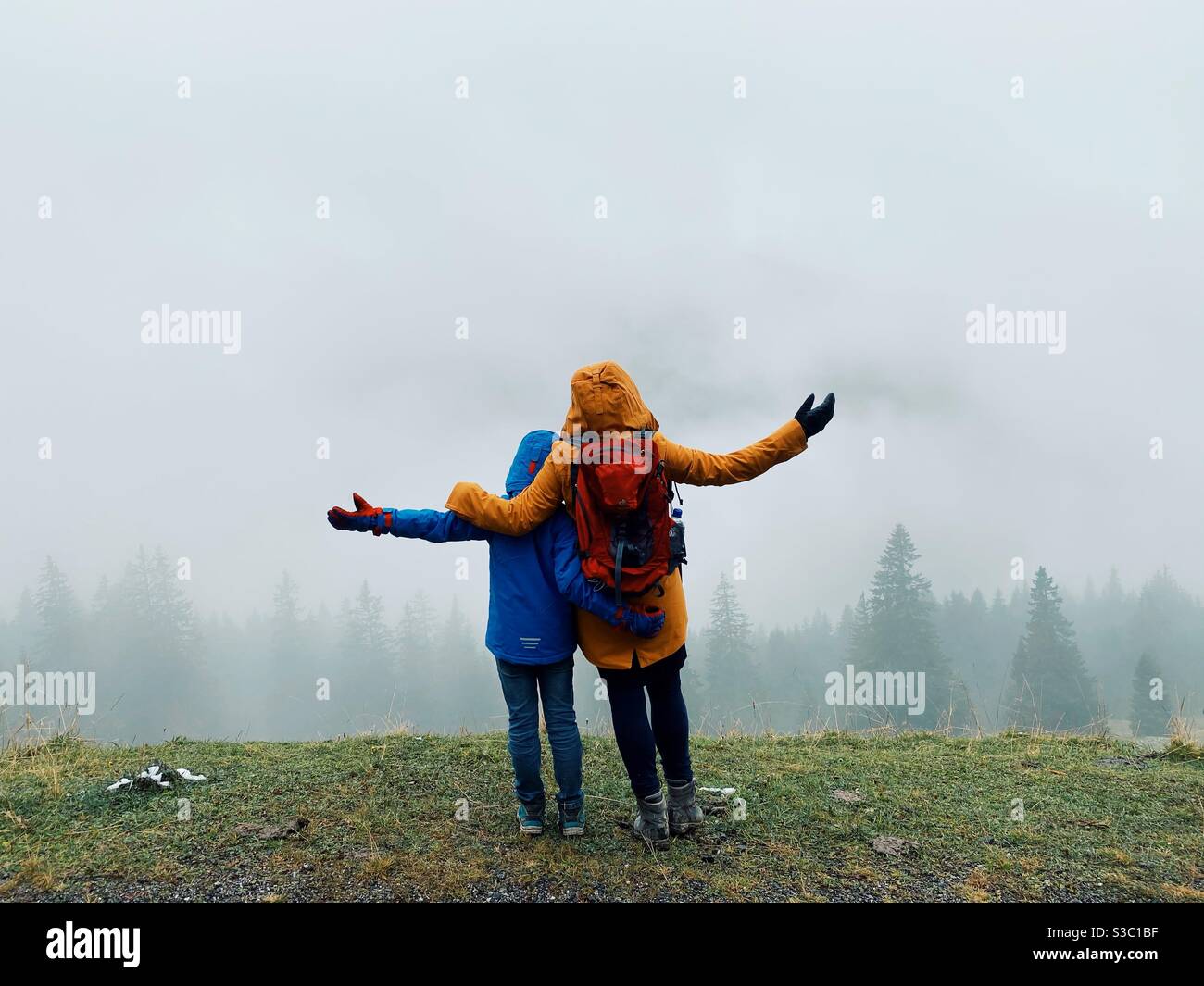 A mother and her son Hiking in the German Alps, Bolsterlang, Bavaria, Germany Stock Photo