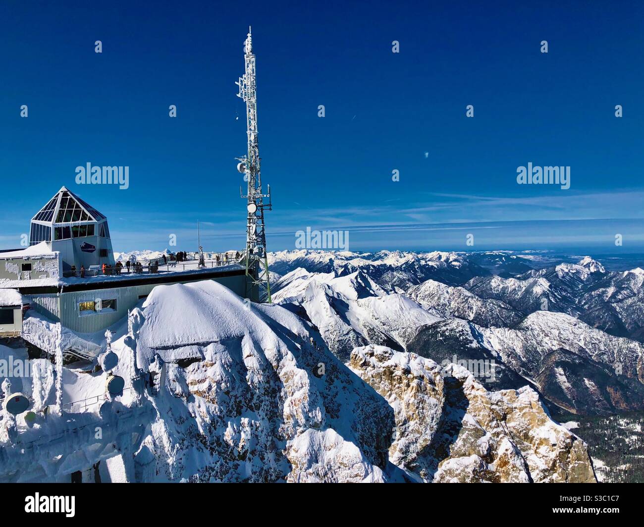 Alpine peaks and cable car station view from Zugspitze 2962m, the highest German mountain. - Smartphone Captured Stock Image