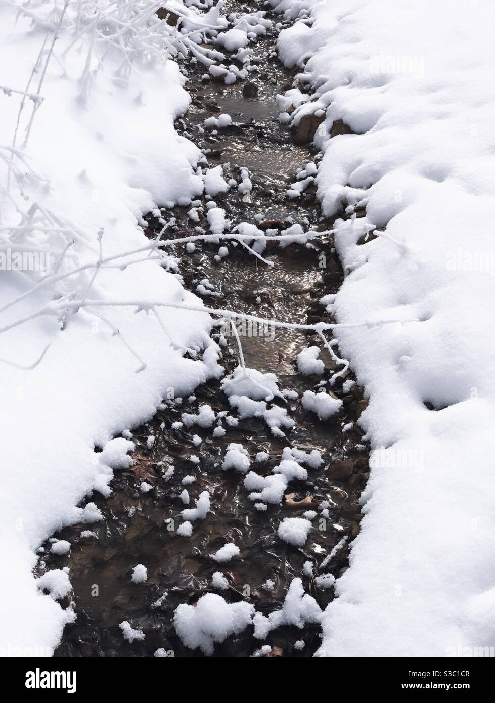 Snowy stream Stock Photo
