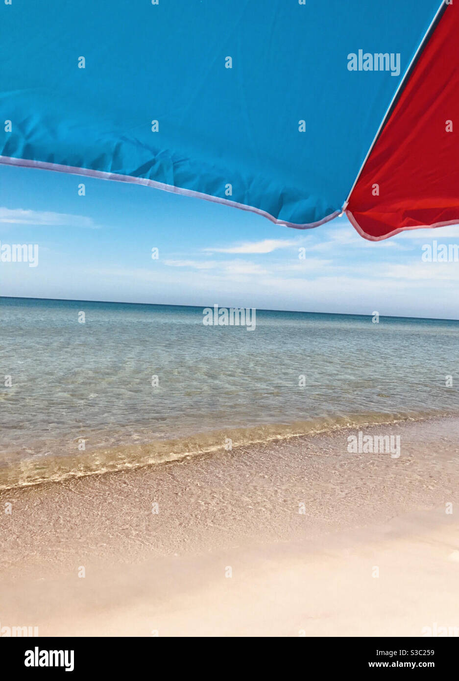 Beachfront umbrella Stock Photo