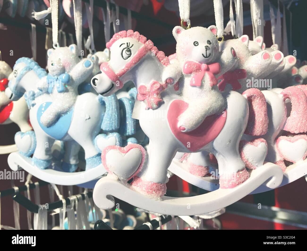 Retail display of cute child hood ornaments of teddy bears riding hobby horses - Smartphone Captured Stock Image