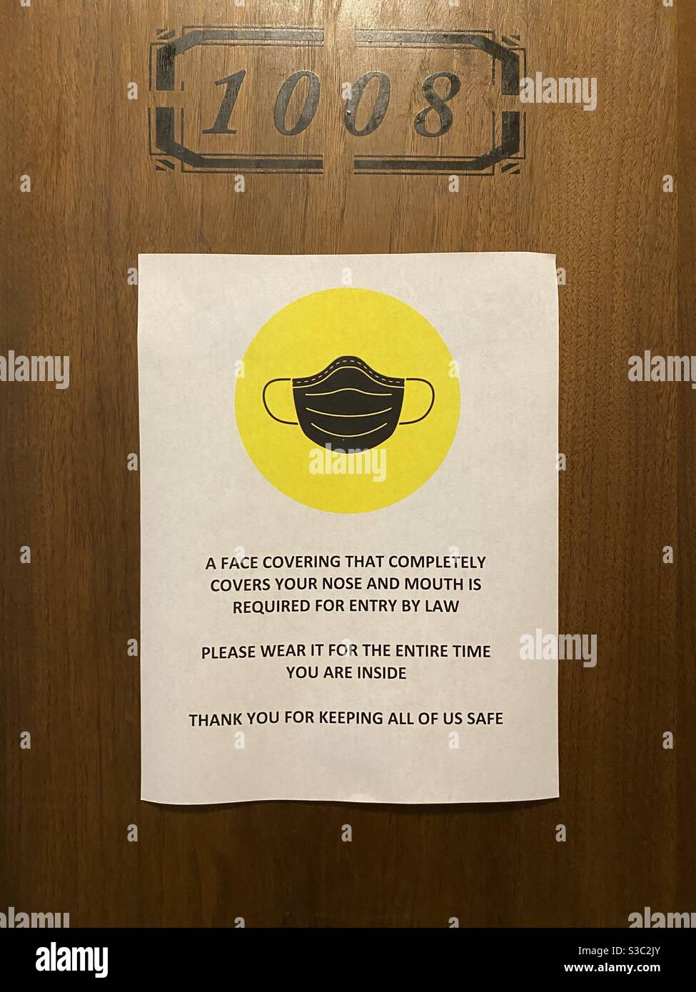 LOS ANGELES, CA, SEP 2020 yellow and black sign on a business door