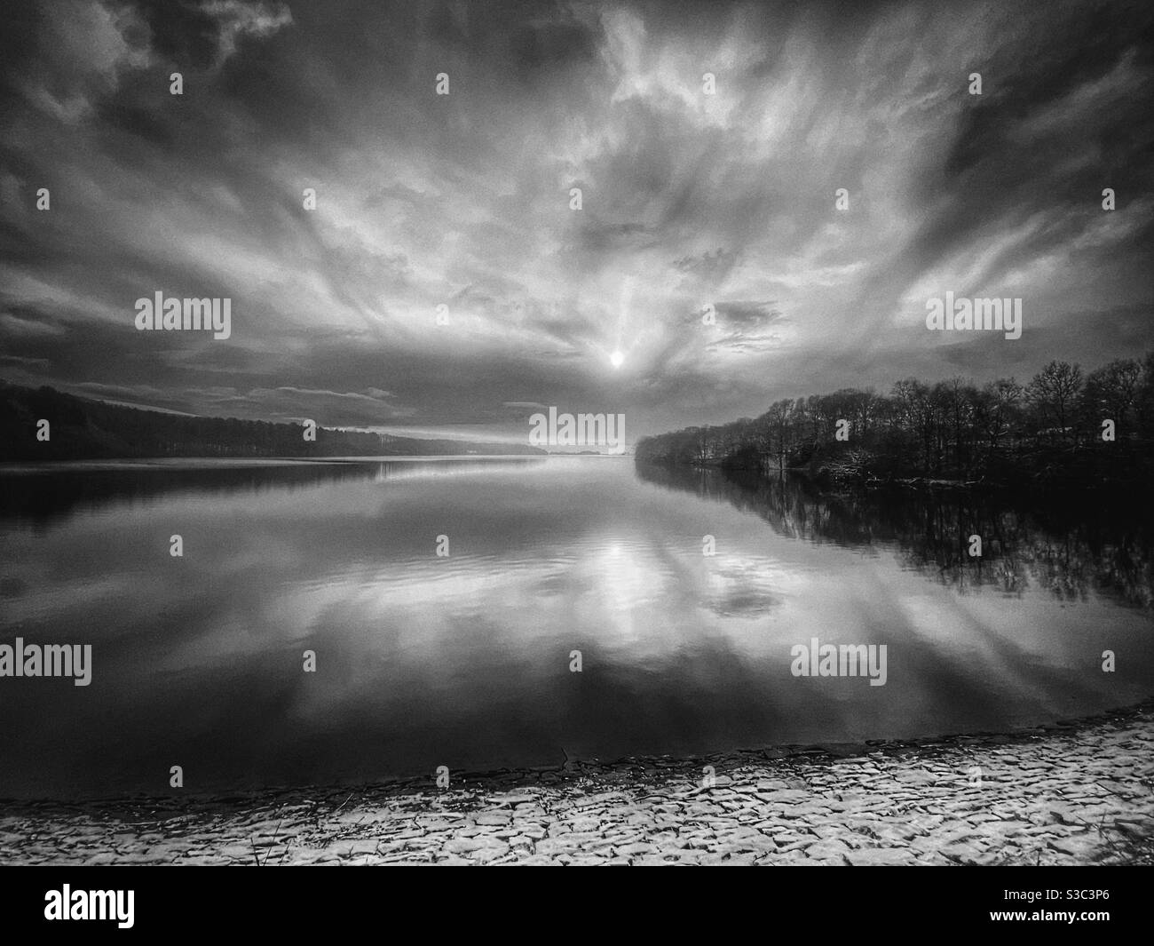 Rivington reservoir in Lancashire on a winter morning with a covering of snow Stock Photo