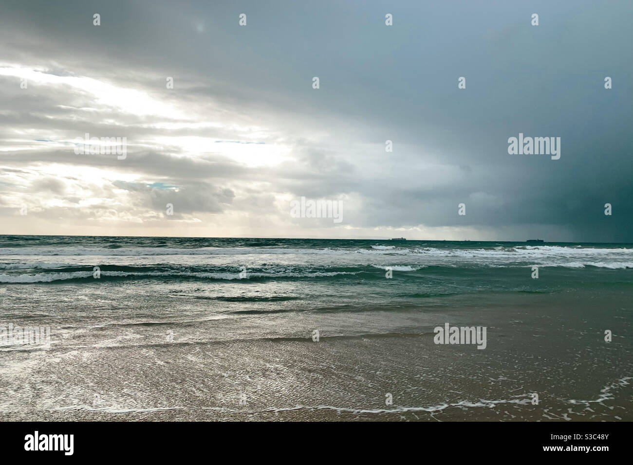 Seascape with dark clouds moving in. - Smartphone Captured Stock Image