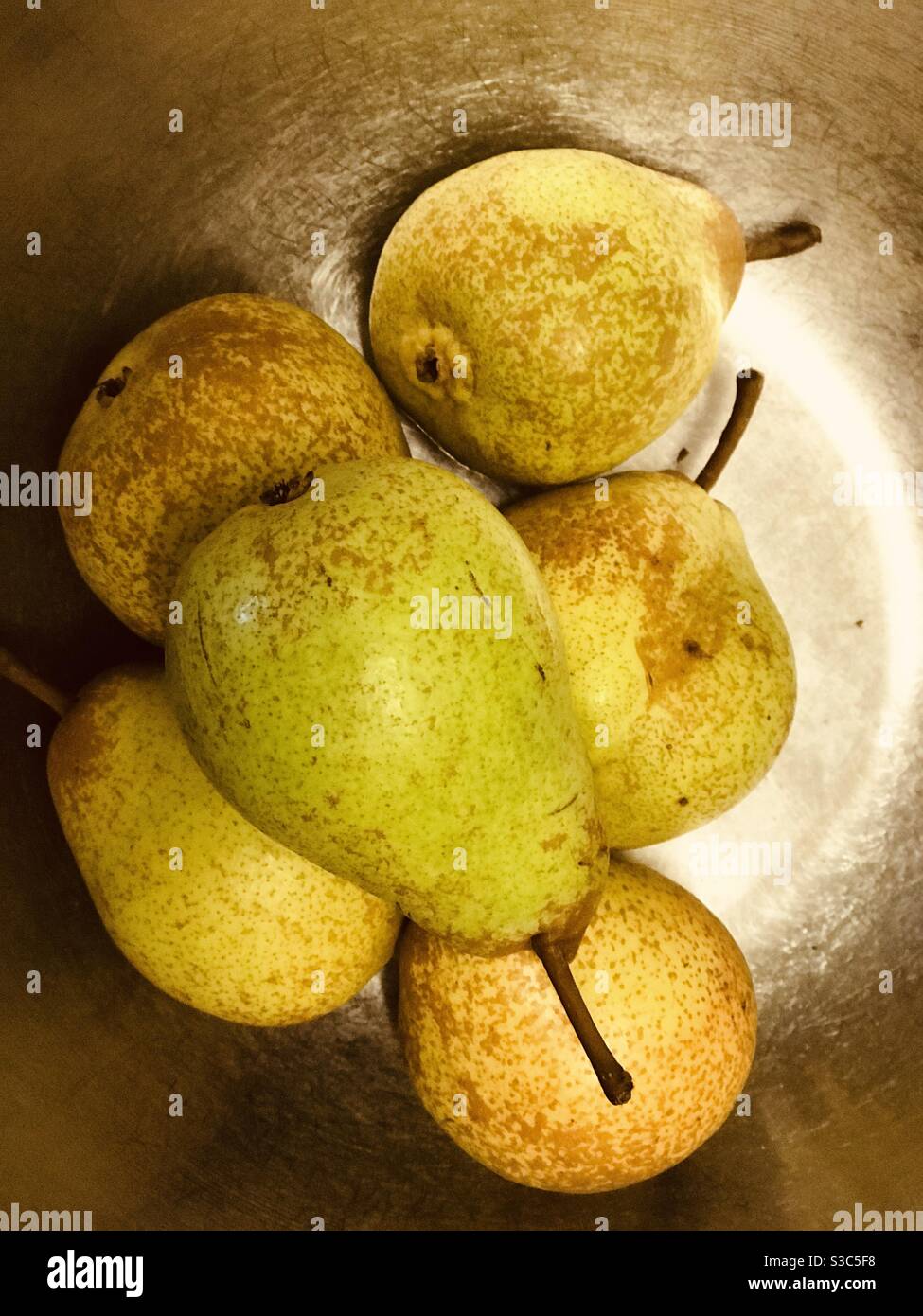 yellow speckled pears in the bowl - Smartphone Captured Stock Image