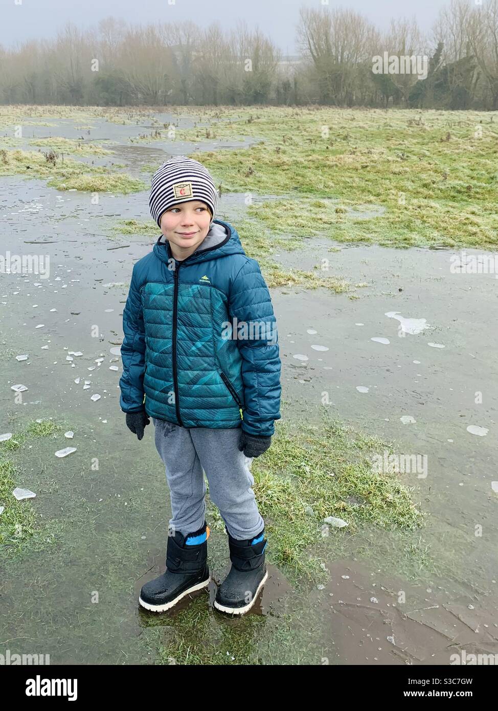 Boy walking on Ice - Smartphone Captured Stock Image