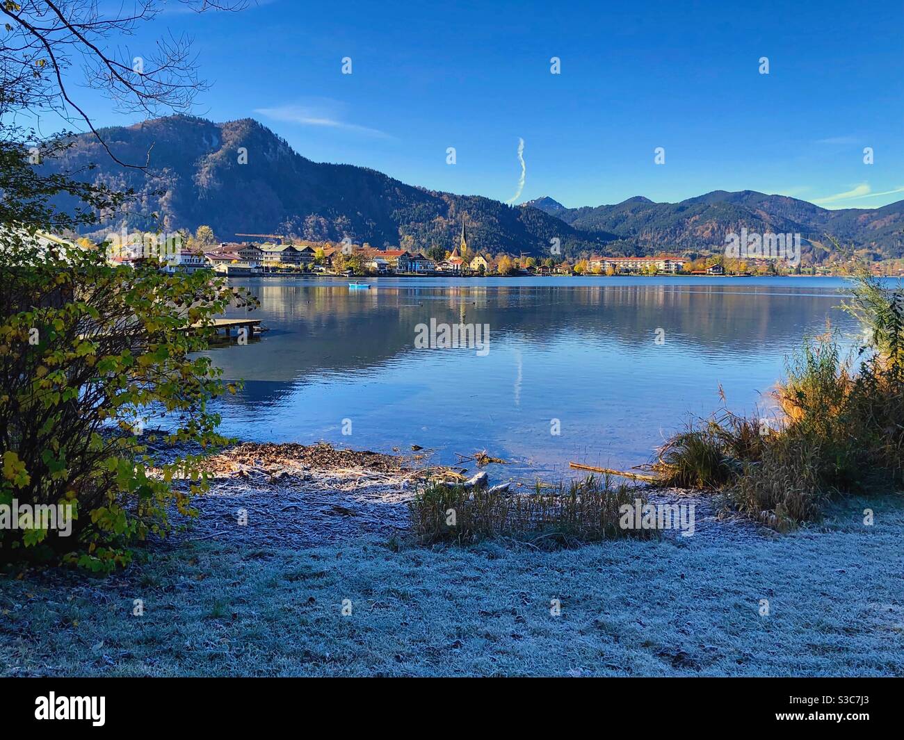 First snow alpine view at lake Tegernsee and the mountains behind in Bavaria, Germany. - Smartphone Captured Stock Image