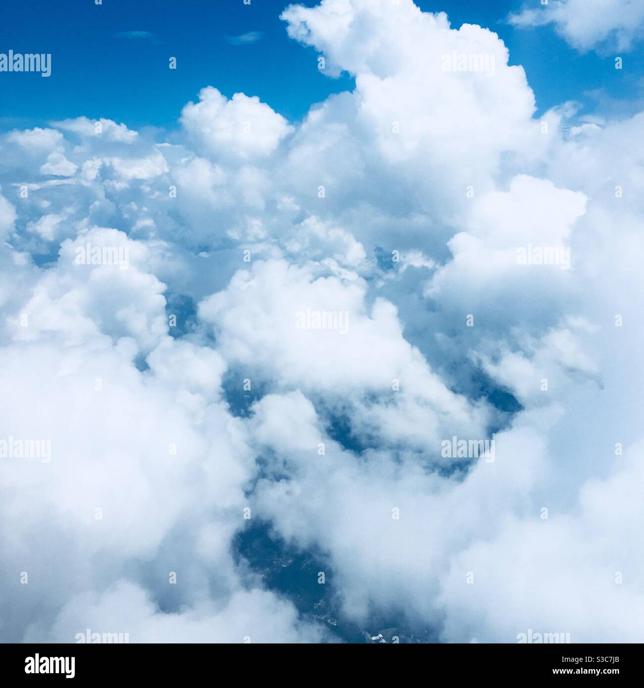 Blue cloud floating on blue sky with fake star light surround cloud Stock  Photo - Alamy