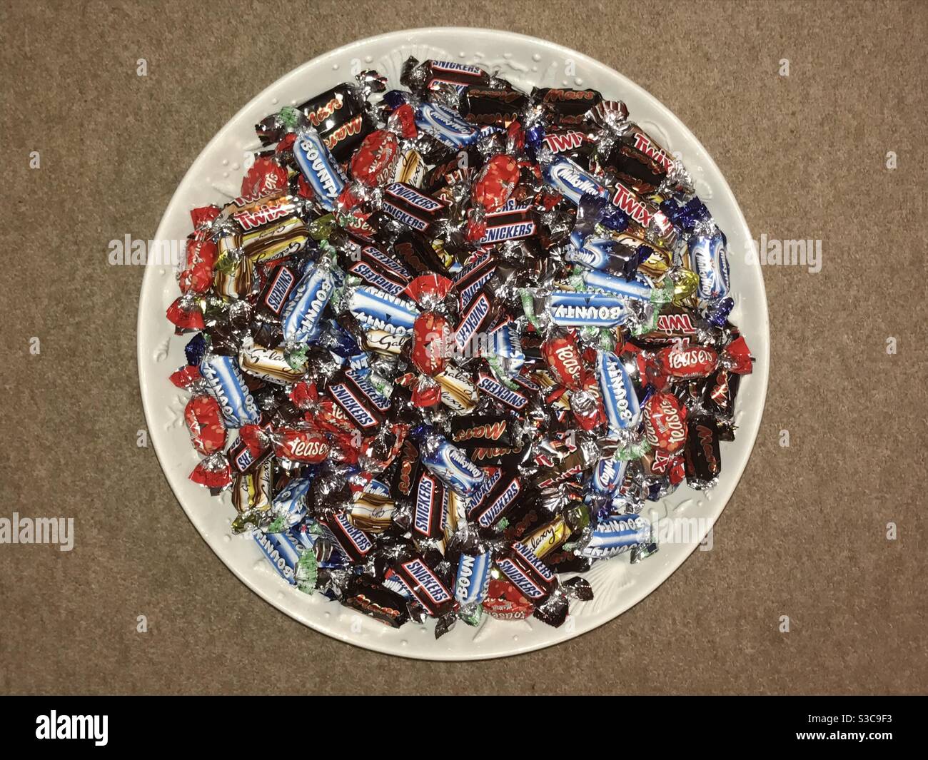 A large bowl of “Celebration” chocolate mini bars Stock Photo Alamy
