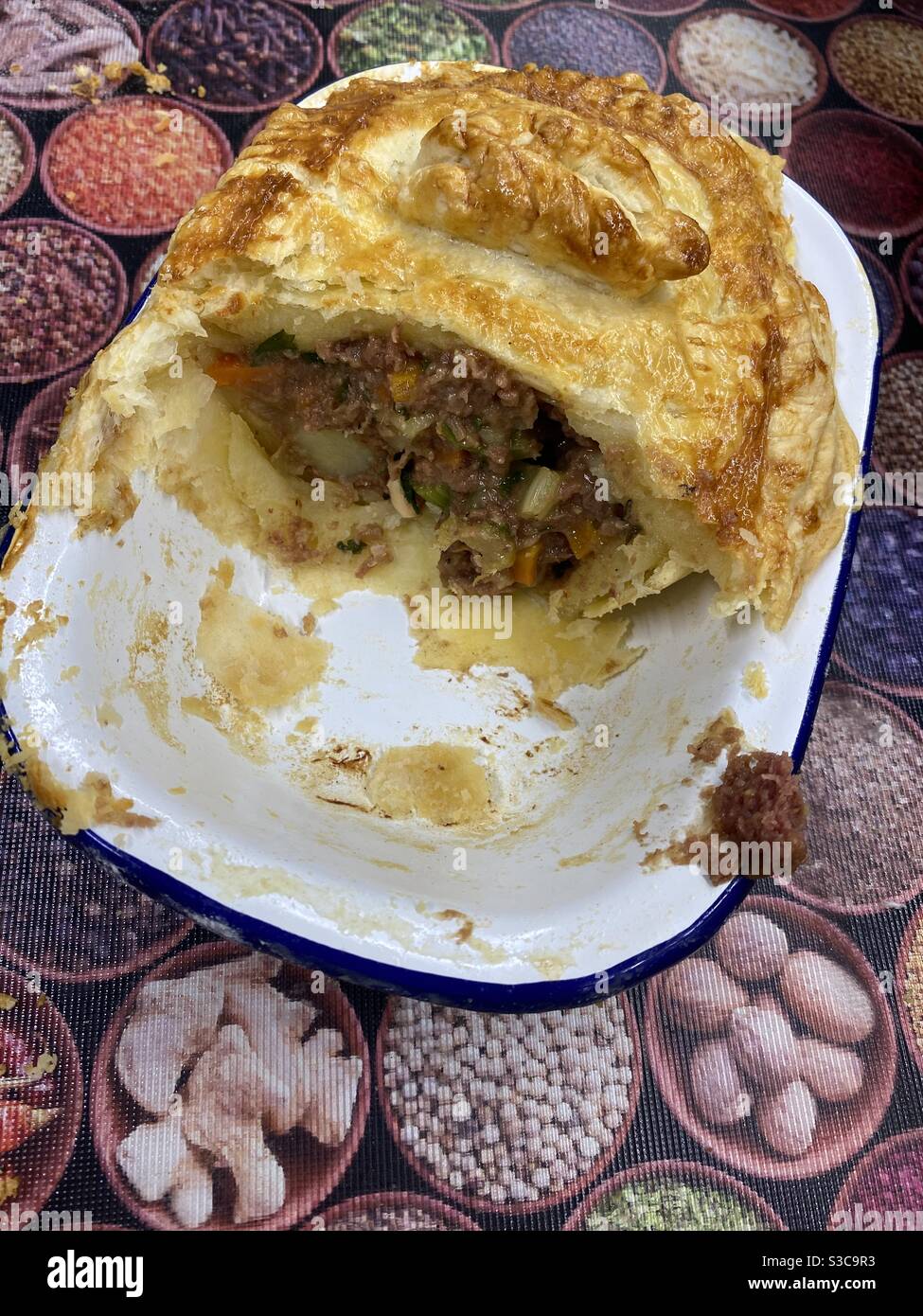 Yum, Half eaten Puff Pastry Pot Pie - Smartphone Captured Stock Image
