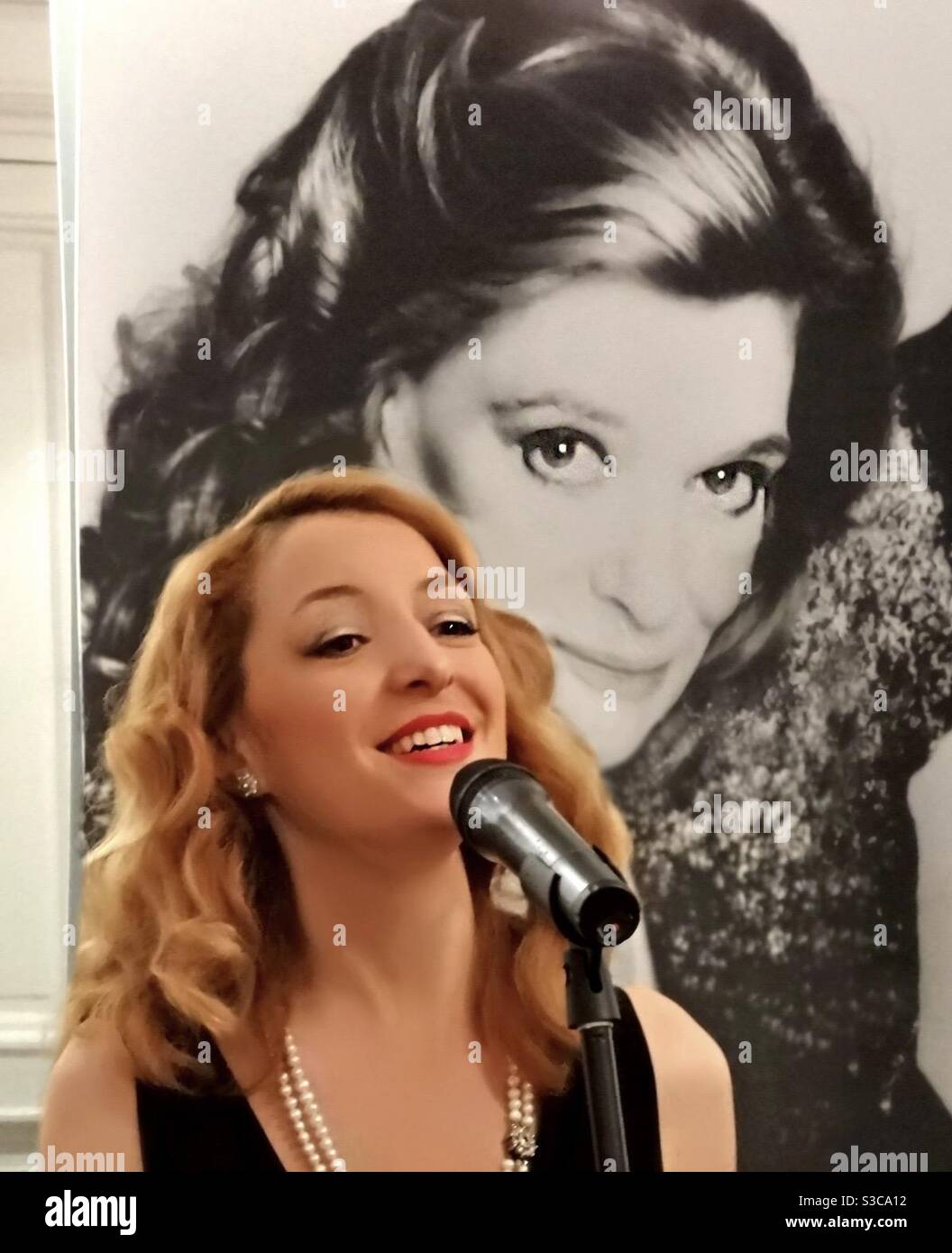 Noted Greek singer Tina Alexopoulou in Paris, in her acclaimed tribute performance to Melina Mercuri, the famous Greek actress, singer, film star & politician. Tina has performed this in 3 countries. Stock Photo