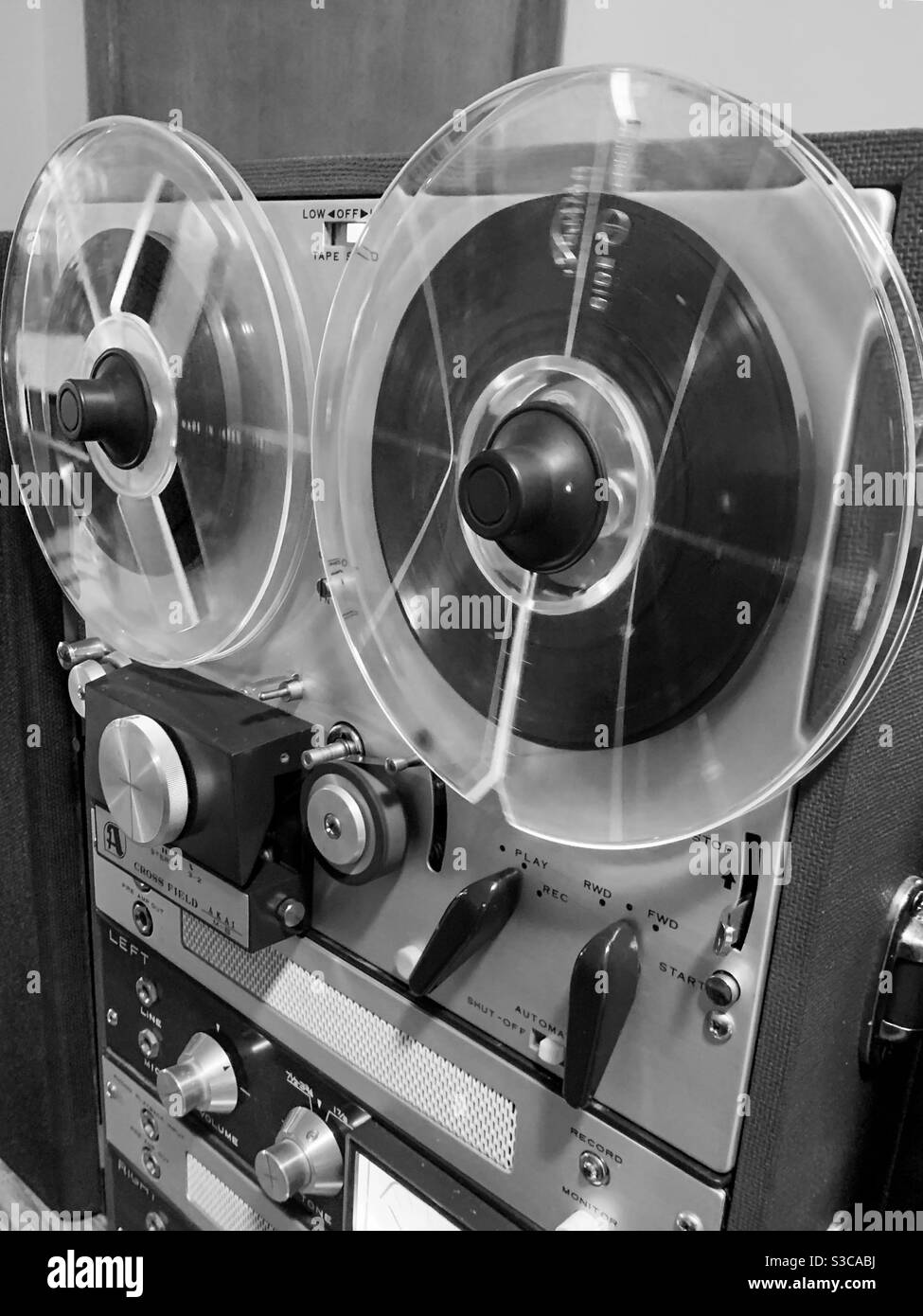 Black and white photo of an old Reel to reel tape recorder - Smartphone Captured Stock Image