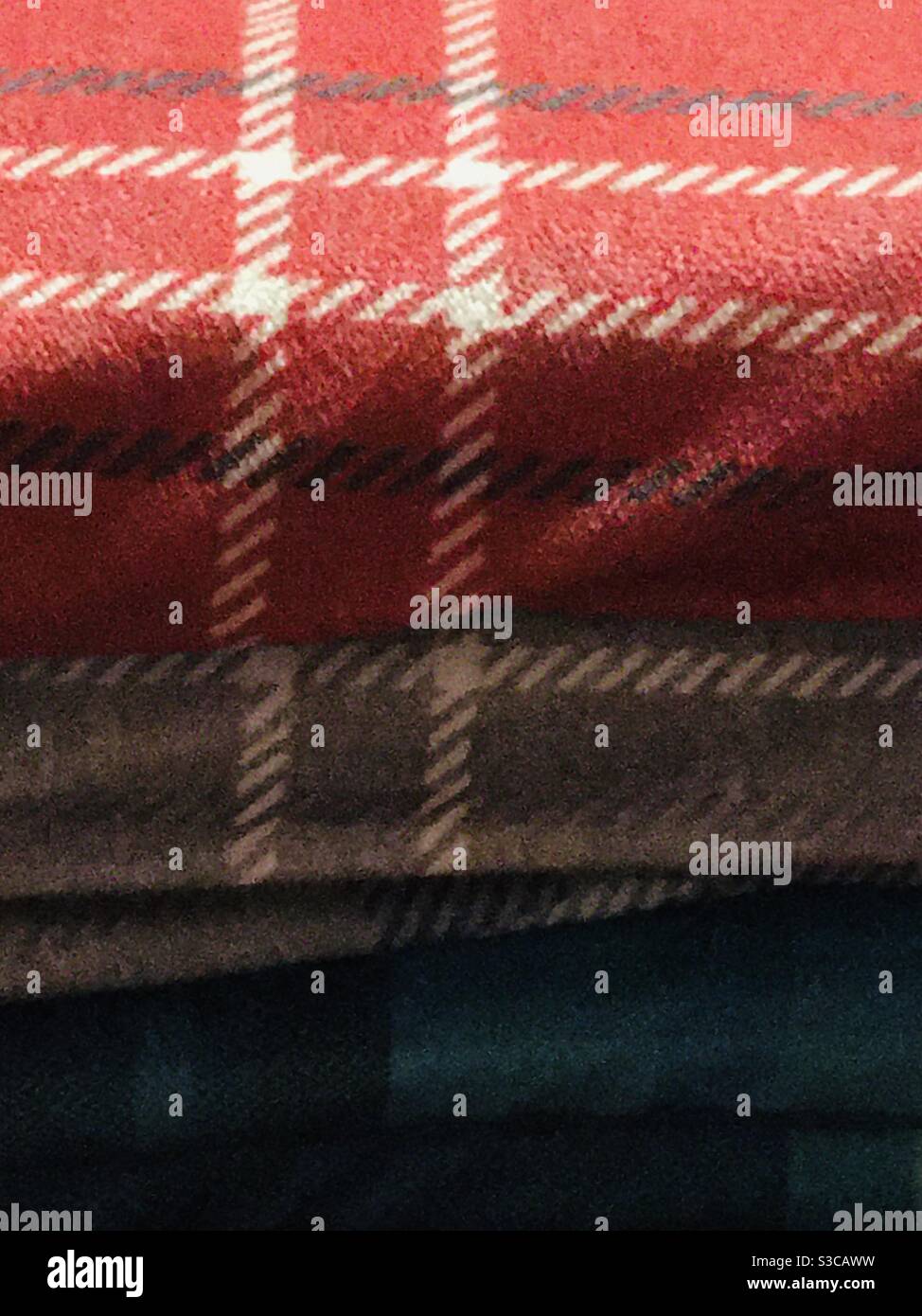 Close up of cosy winter blankets - throws Stock Photo