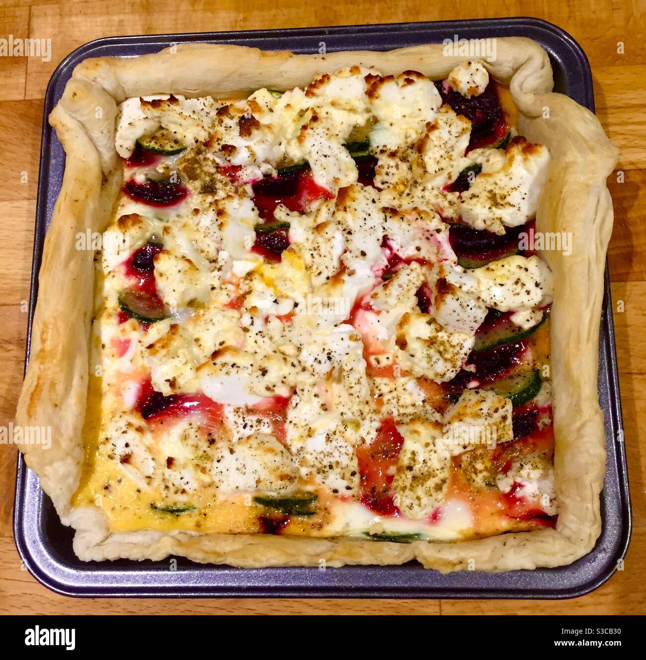 Goat’s Cheese, Courgette and Beetroot Tart Stock Photo Alamy