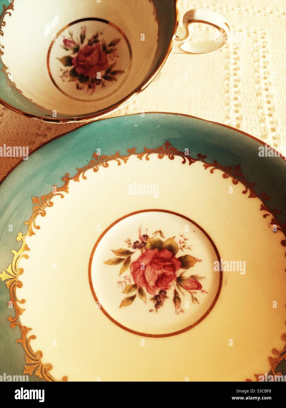 Close up of a dinner plate and tea cup of find bone bell China, made in England. - Smartphone Captured Stock Image