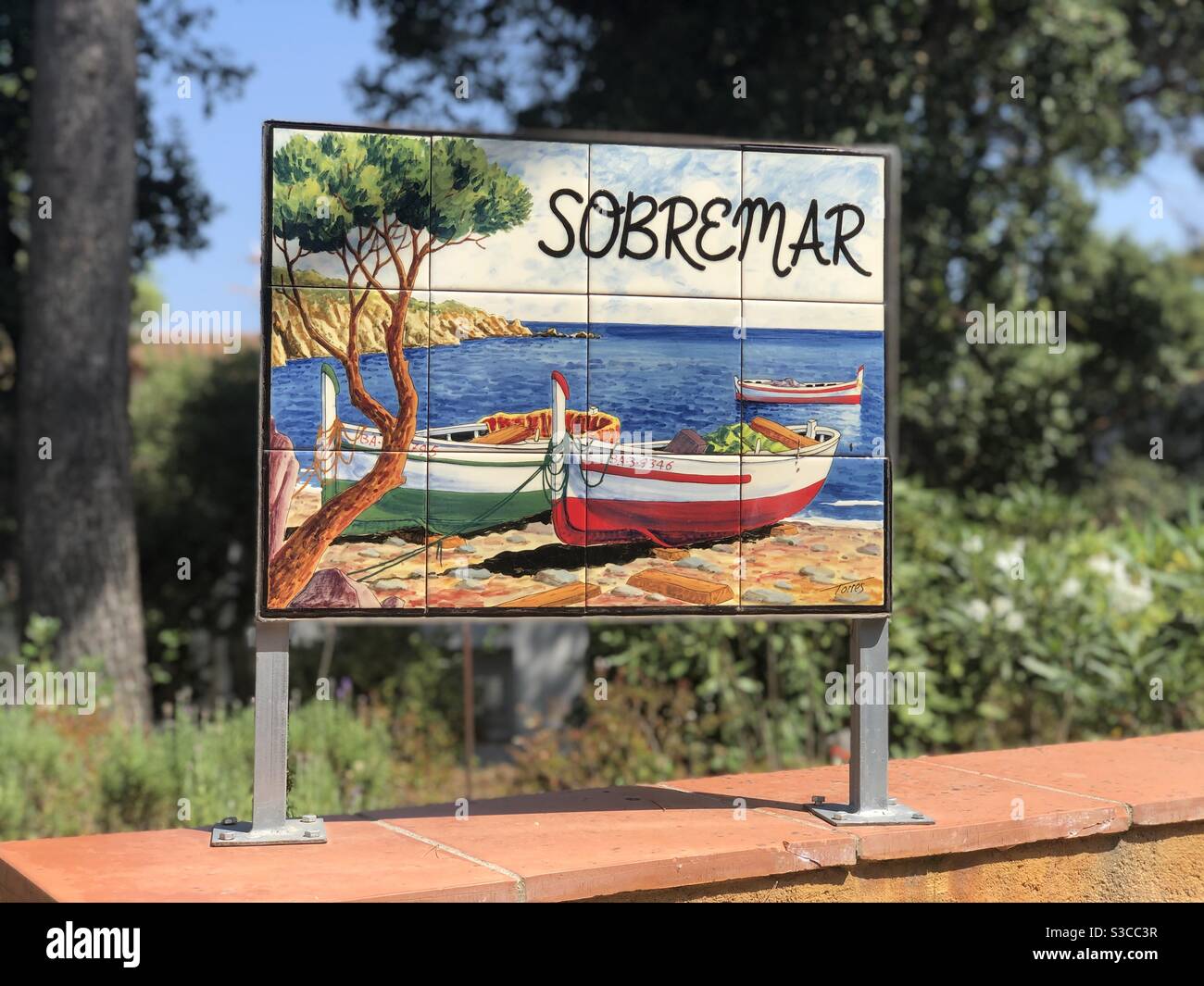 Sign of Sobremar where there are boats on the sign Stock Photo