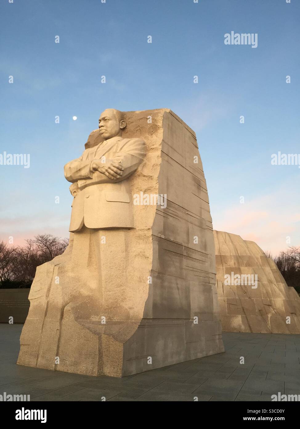 The moon sets behind the Martin Luther King memorial in Washington DC. - Smartphone Captured Stock Image
