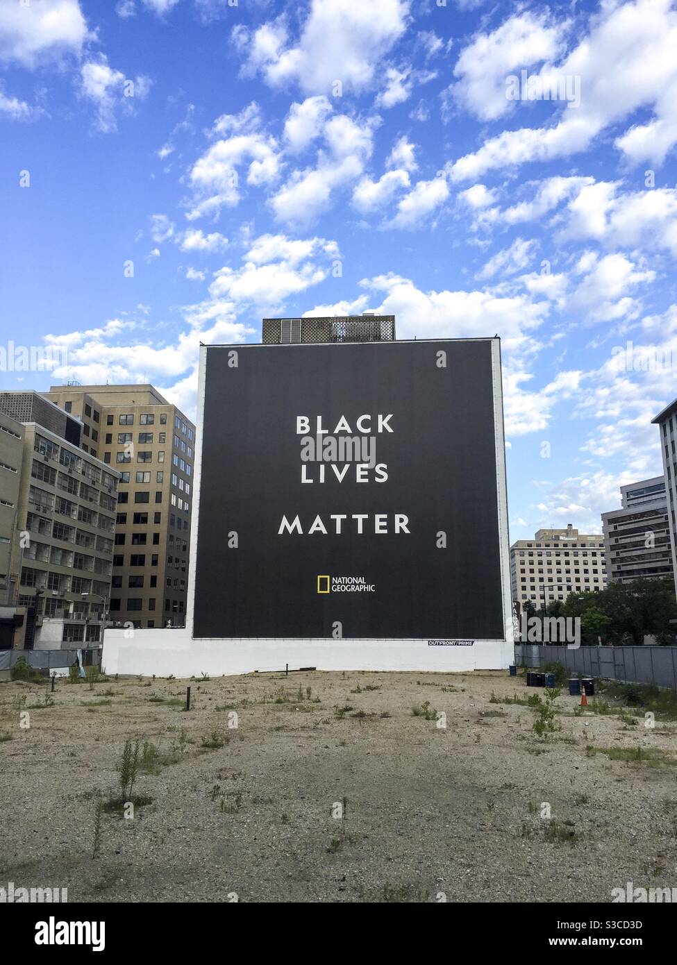 A Black Lives Matter sign covers the side of a building in Washington DC. Stock Photo