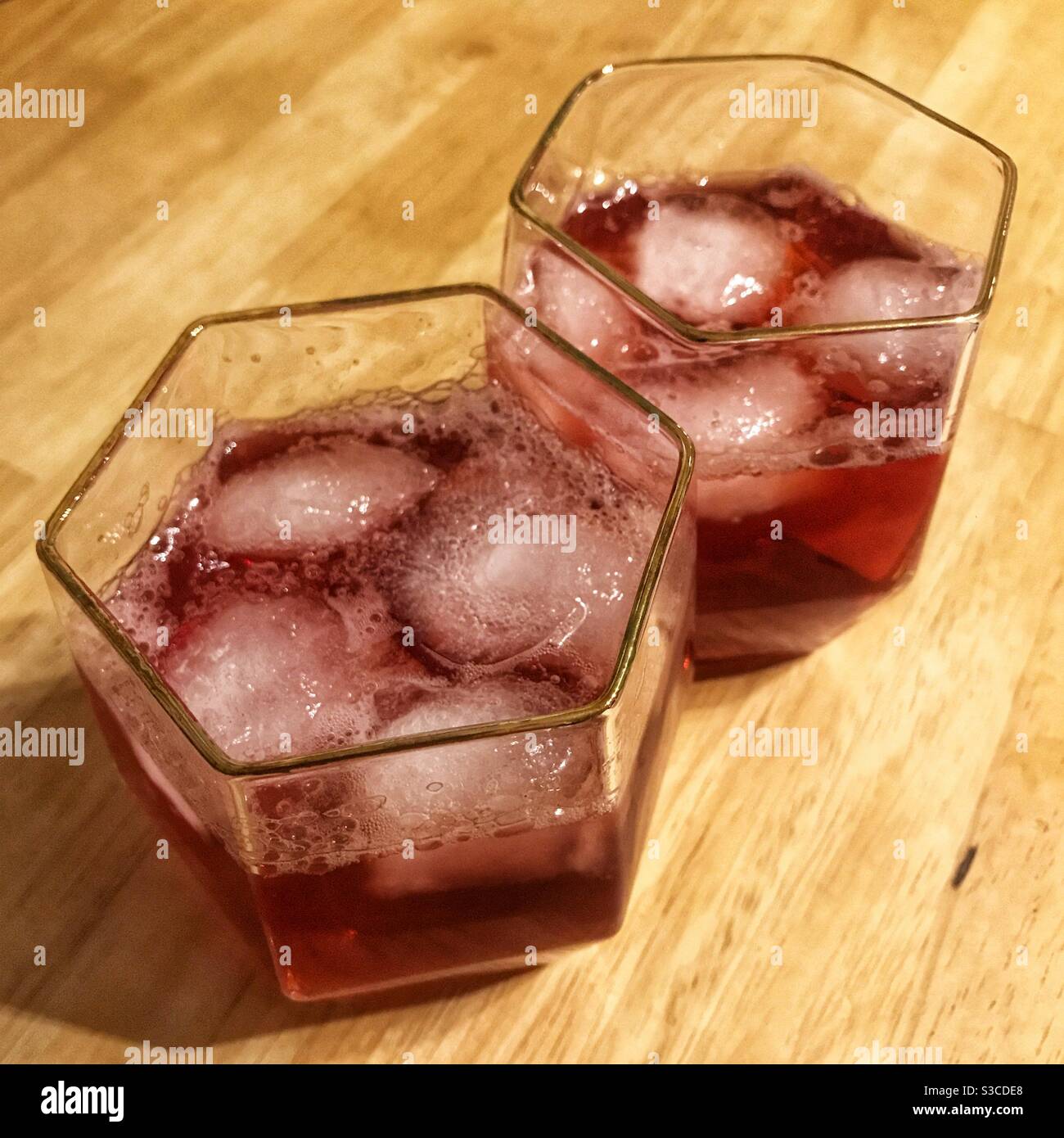 Sloe gin and ginger ale cocktails. Stock Photo