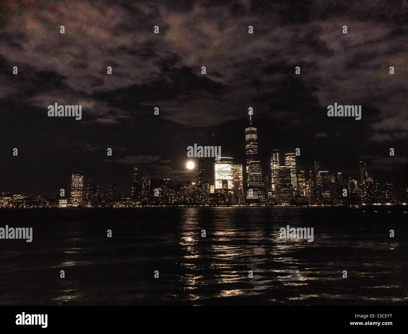 Lower Manhattan skyline at night Stock Photo
