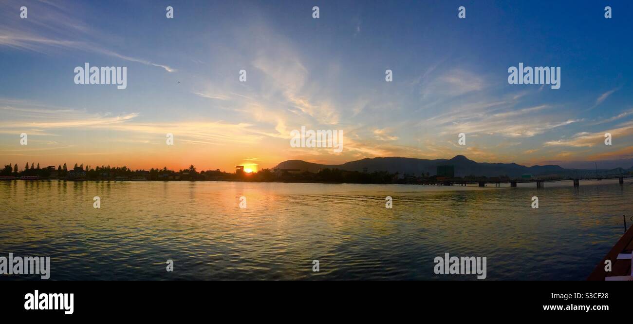 Sunset on the river in Kampot Cambodia Stock Photo