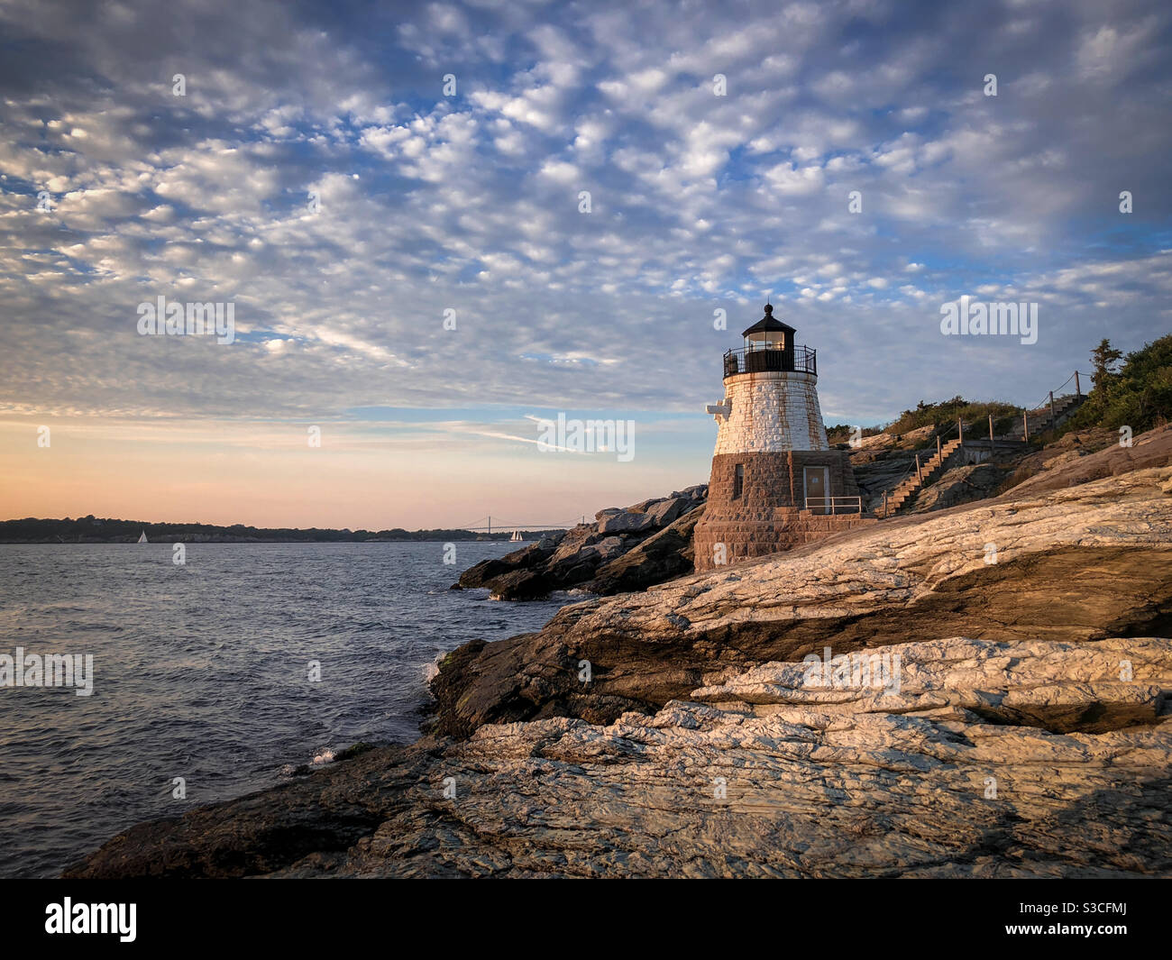 Castle Hill Lighthouse near sunset along Narragansett Bay in Newport