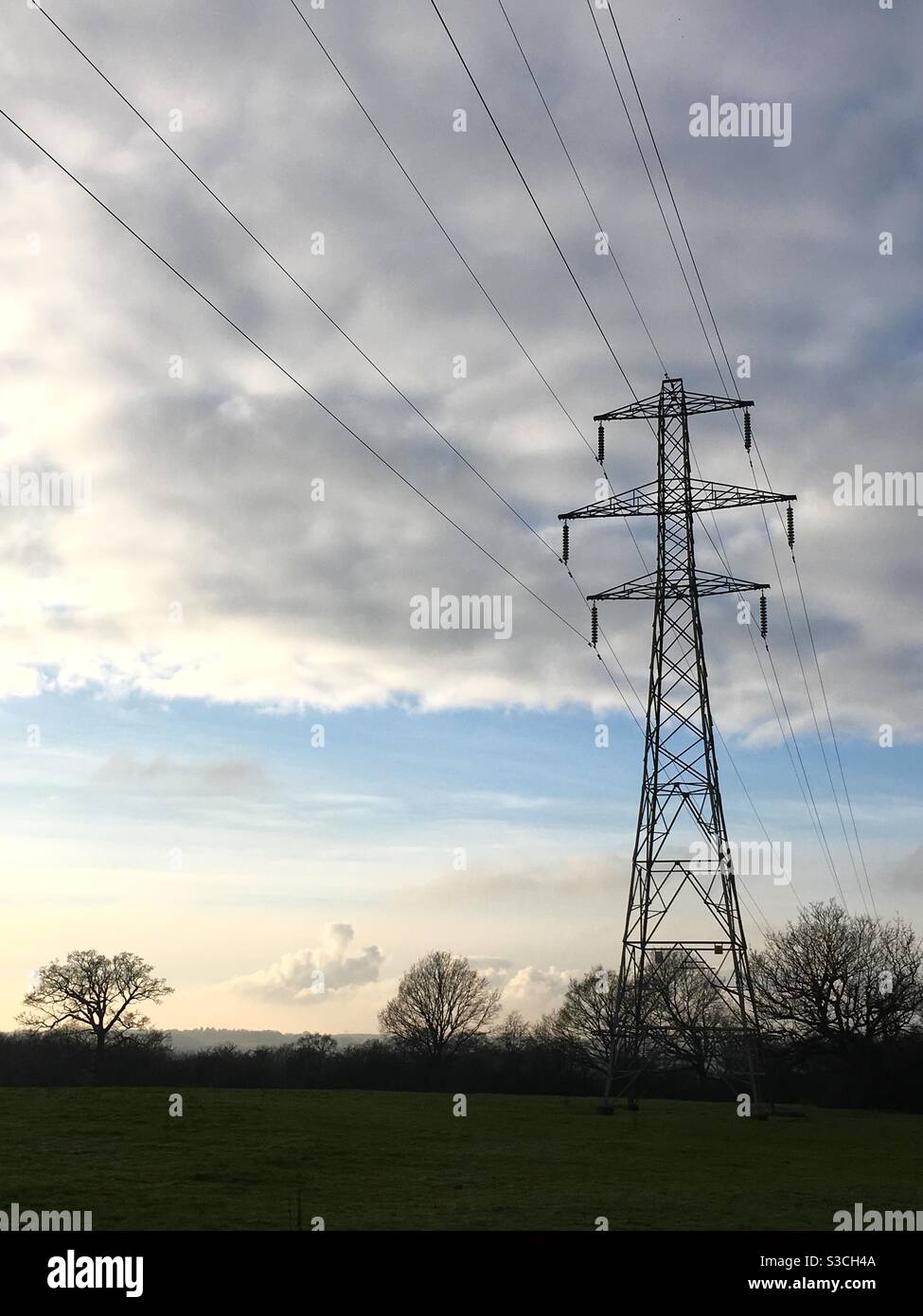 Pylon at the edge of a field in the countryside - Smartphone Captured Stock Image