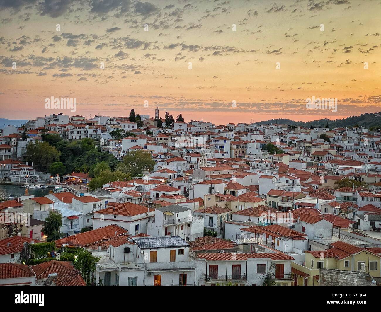 Sunset view at Skiathos town from St. Nicholas Church, Greece. - Smartphone Captured Stock Image