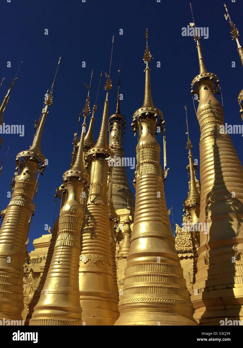 Gold stupas at Phaung Daw U Pagoda Inle Lake Myanmar - Smartphone Captured Stock Image