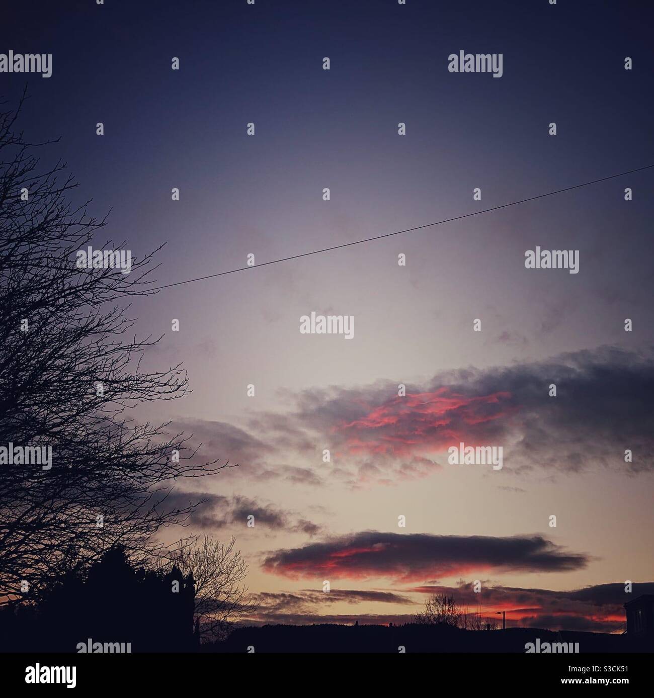 A photograph of beautiful clouds at sunset - Smartphone Captured Stock Image