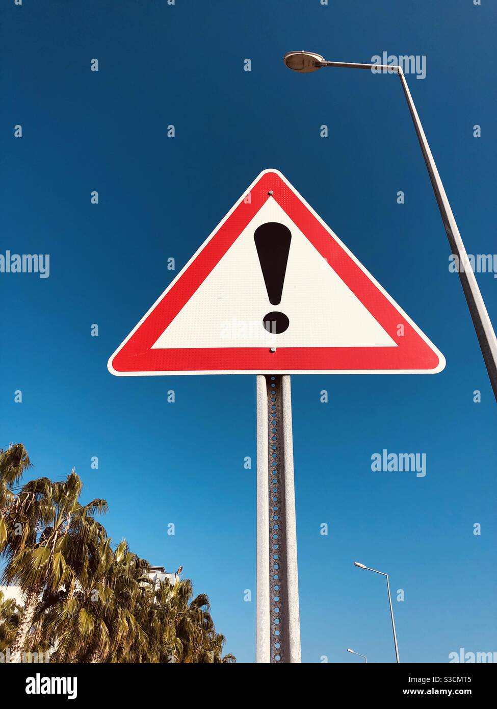 Caution Road sign - Smartphone Captured Stock Image