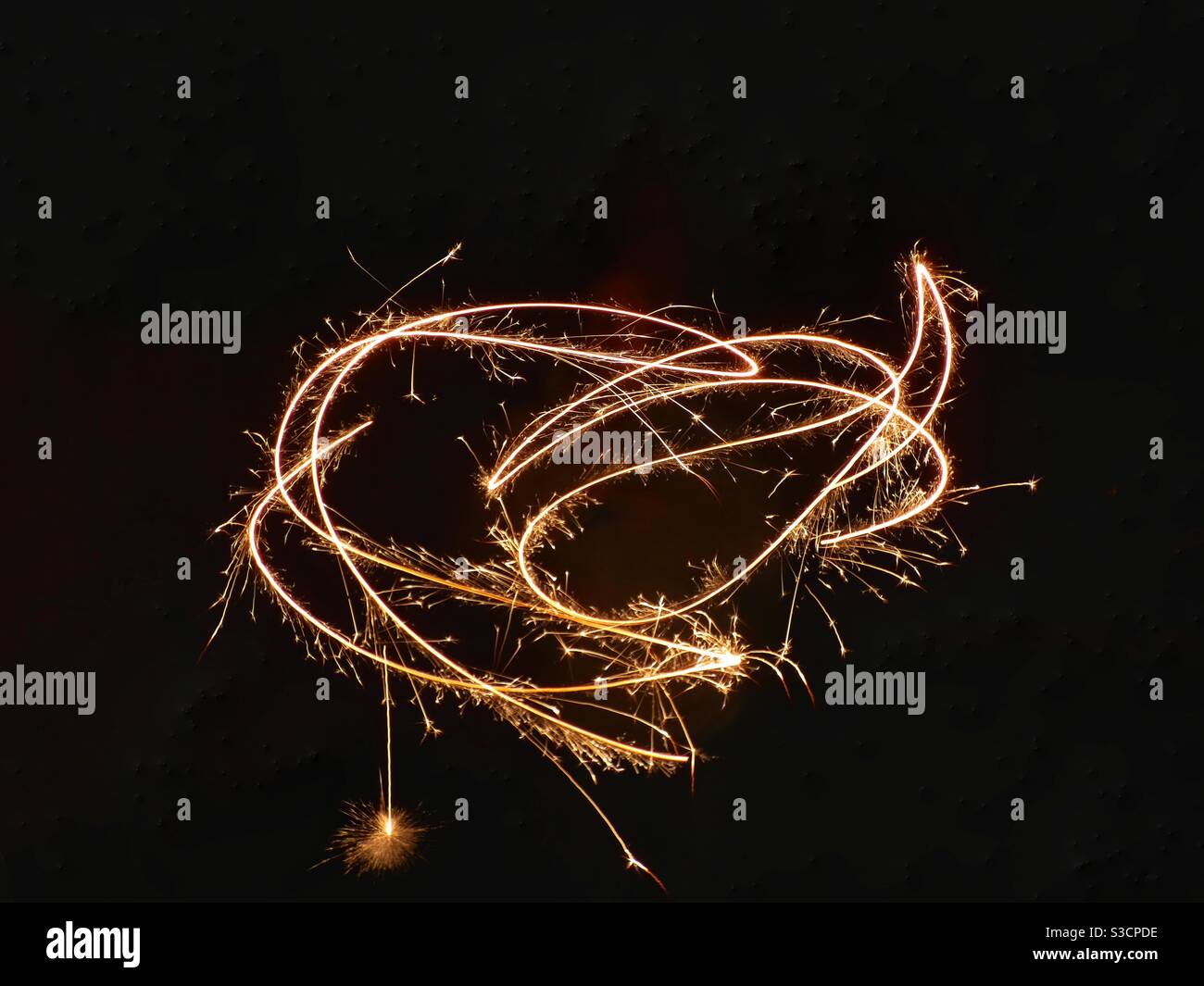 Sparklers Lighting Up The Dark Night Stock Photo Alamy