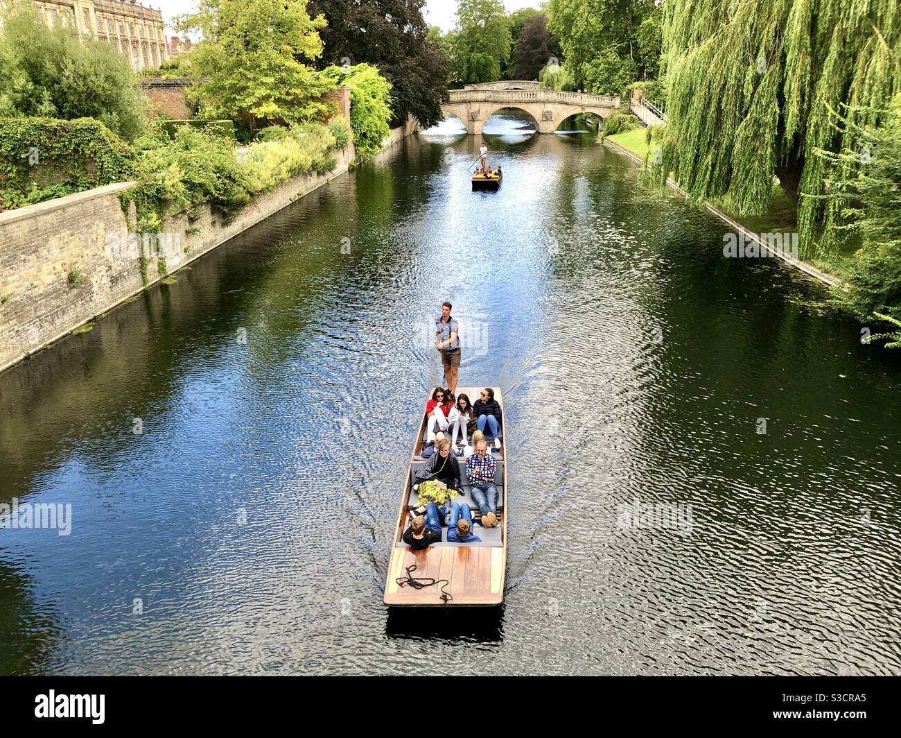 Tourists punting on the river Cam in Cambridge - Smartphone Captured Stock Image