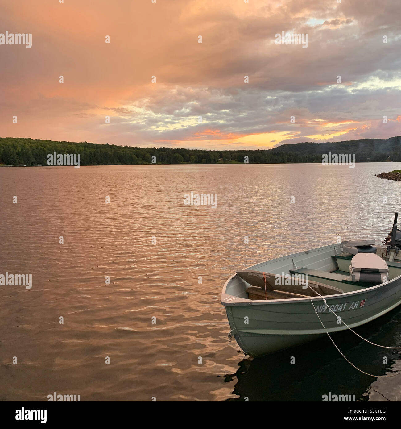 A boat on Back Lake at the Tall Timber Lodge, Pittsburg, New Hampshire, United States - Smartphone Captured Stock Image