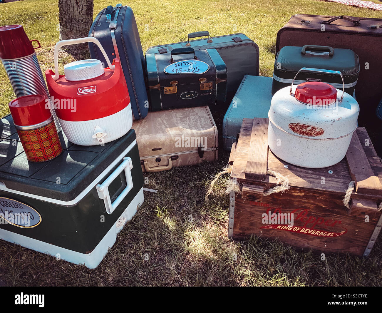 Vintage retro suitcases and coolers for sale at a local Volkswagen Bug Jam on Amelia Island, Florida, USA Stock Photo