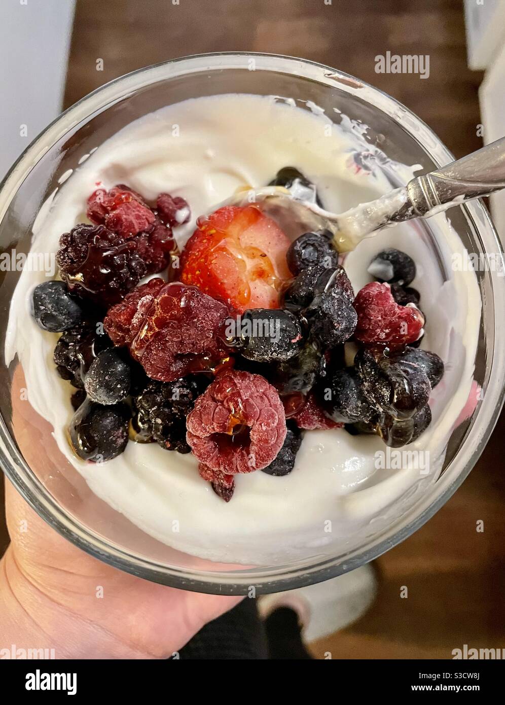 Frozen Berries In Yogurt with Honey Stock Photo Alamy