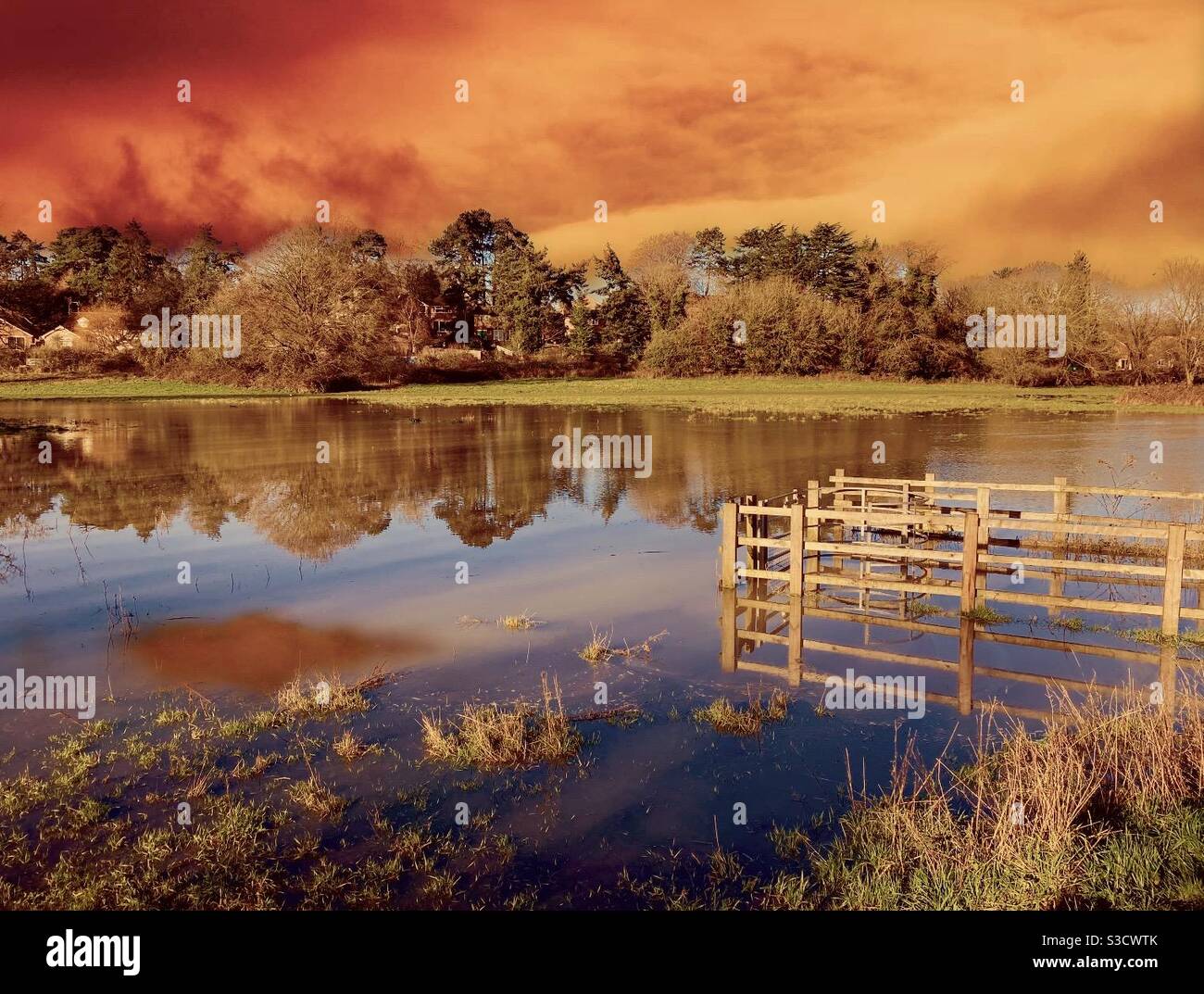 Floods at the Ouzel Meadows in Leighton Buzzard at sunset Stock Photo