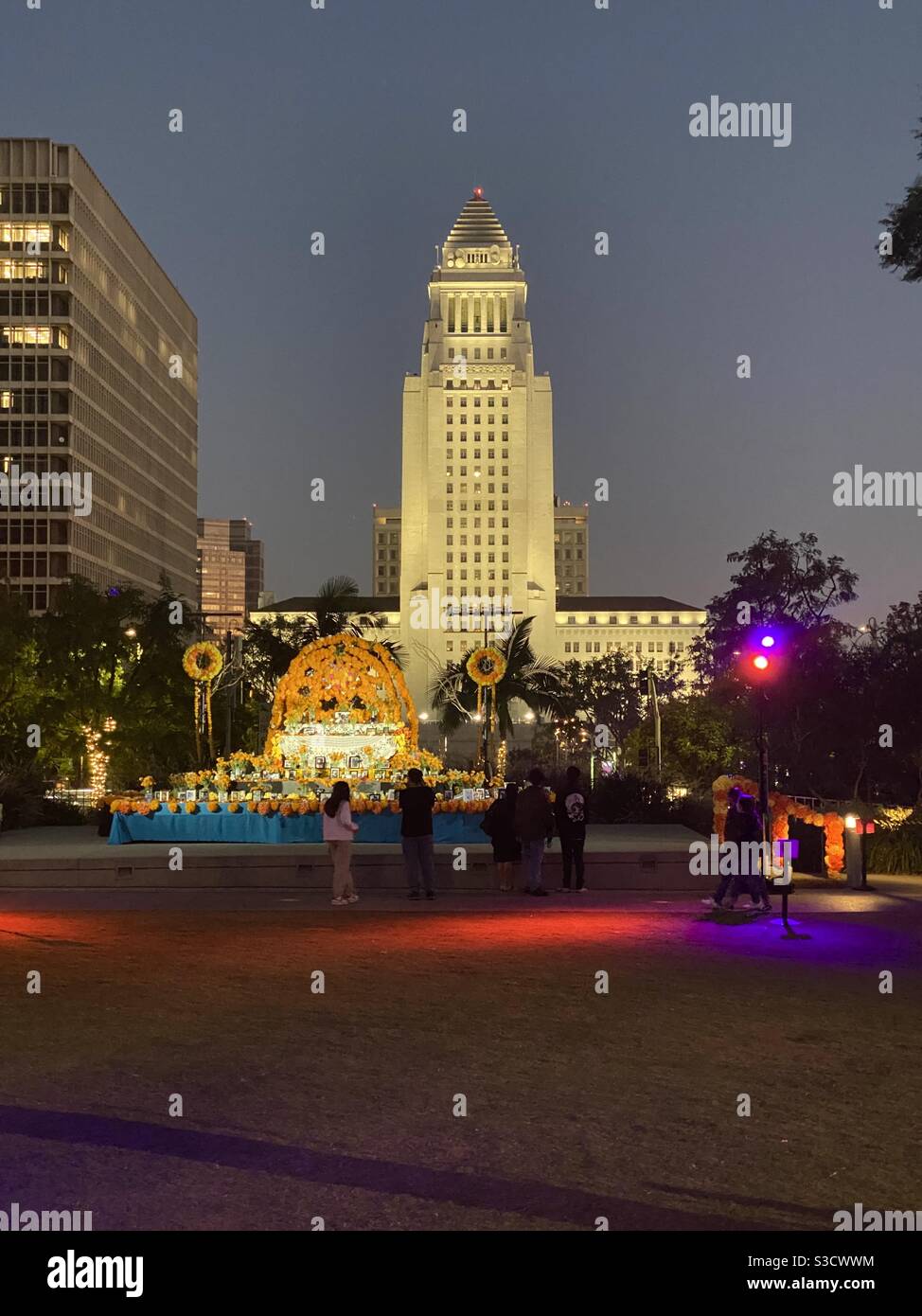 LOS ANGELES, CA, NOV 2020: City Hall with Day of the Dead memorial in front, Grand Park, night - Smartphone Captured Stock Image